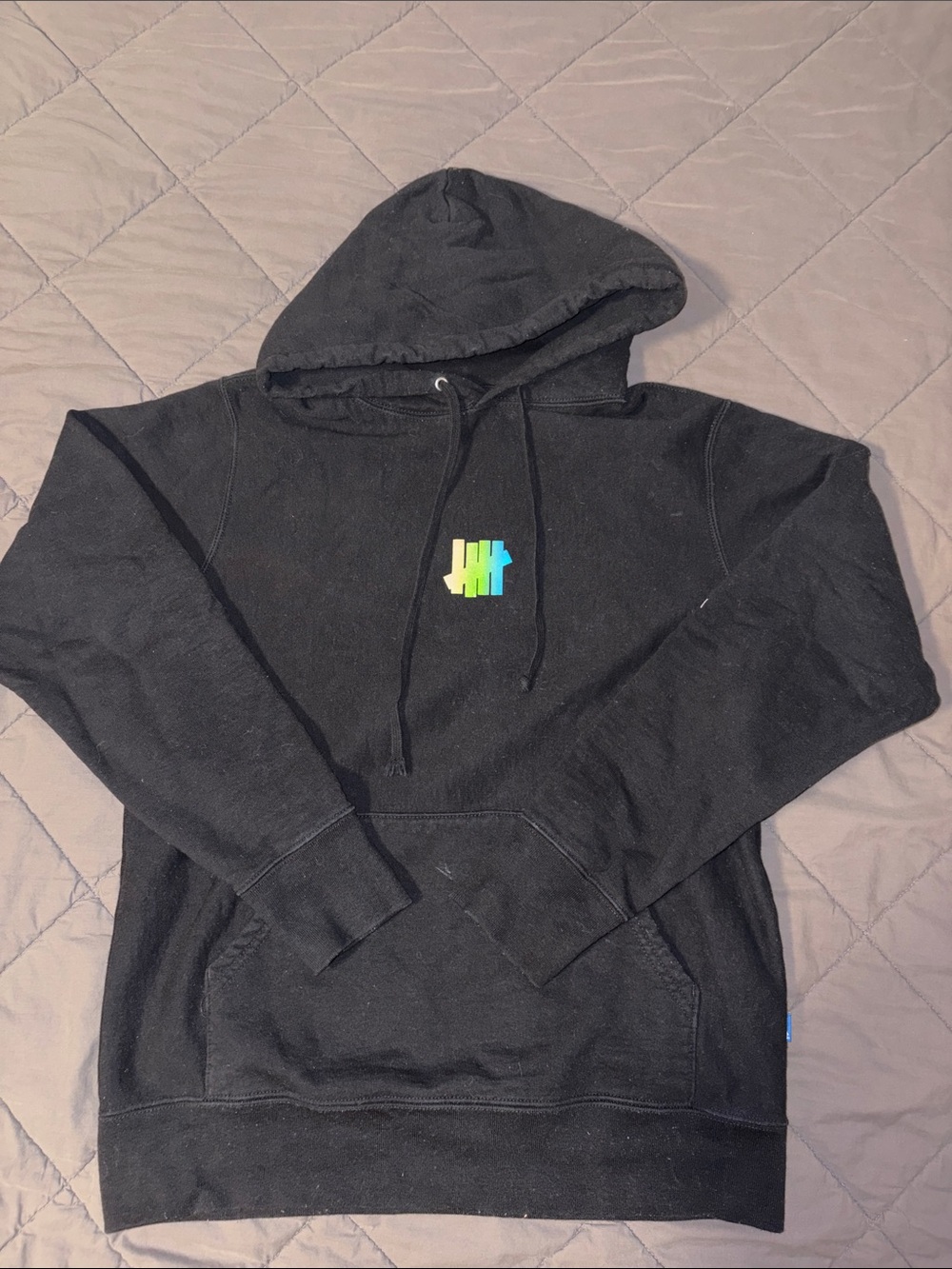 Undefeated Black Hoodie with Neon Multicolor Logo